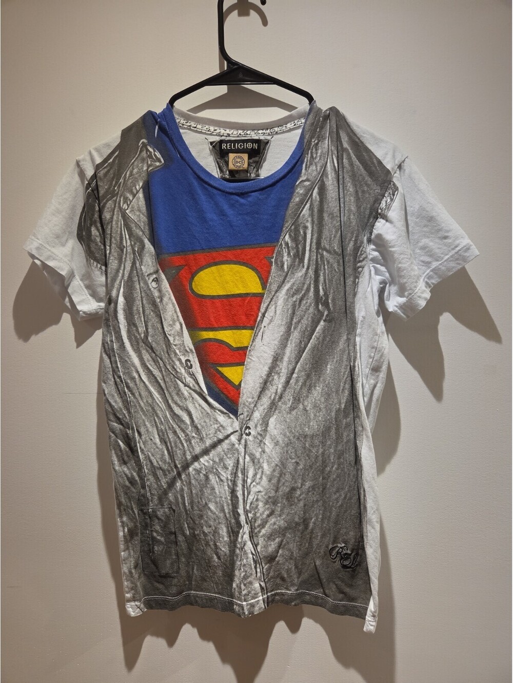 • Official DC Comics Superman T-shirt (©2013)   • Realistic all-over print of Cl